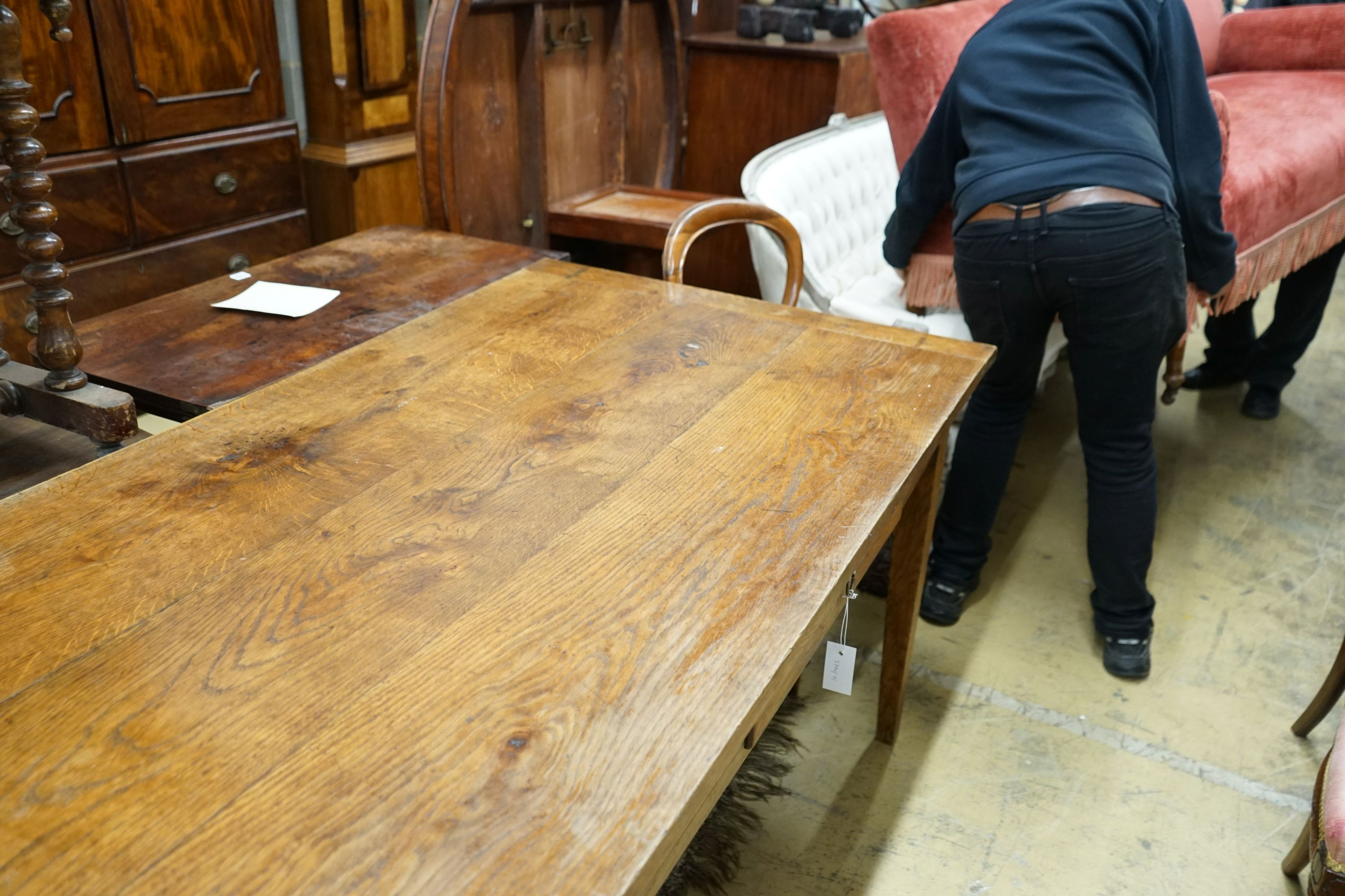 A 19th century French rectangular oak kitchen table, length 183cm, depth 87cm, height 75cm